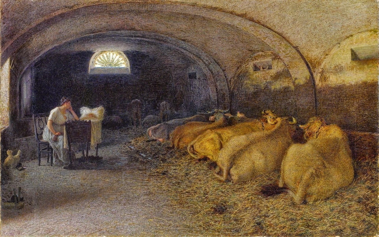 Una giovane madre con il suo bambino in una stalla